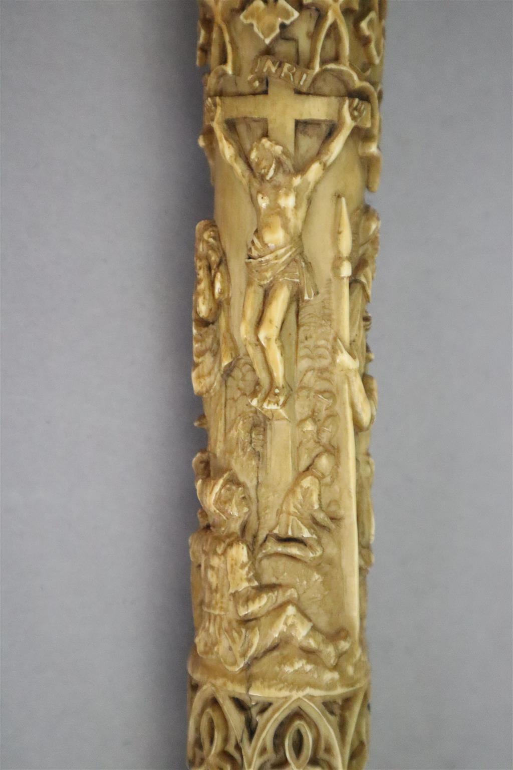 A 19th century Dieppe carved ivory crozier, thought to be a copy of a 13th century example, length 46in.